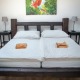 Dvoulůžkový s manželskou postelí a vlastní koupelnou - Cuba Bar & Hostel České Budějovice