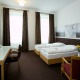 Pokoj Premium s manželskou postelí nebo oddělenými postelemi - Hotel PURKMISTR Kroměříž