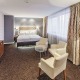 Třílůžkový pokoj typu Deluxe s manželskou postelí a vířivou vanou - Pytloun City Boutique Hotel**** Liberec