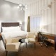 Pokoj typu Royal Club Deluxe s manželskou postelí a vířivou vanou - Pytloun City Boutique Hotel**** Liberec