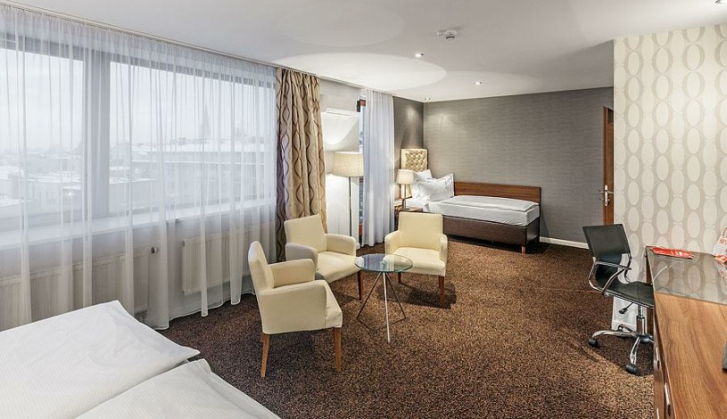 Pytloun City Boutique Hotel**** Liberec - Pokoj typu Royal Club Deluxe s manželskou postelí a vířivou vanou