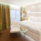 Pokoj typu Deluxe s manželskou postelí a vířivou vanou - Pytloun City Boutique Hotel**** Liberec