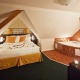 Dvoulůžkový pokoj typu Deluxe s manželskou postelí a vířivou vanou - Pytloun Design Hotel**** Liberec