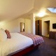 Dvoulůžkový pokoj - podkroví - Hotel Nelly Kelly's Trutnov