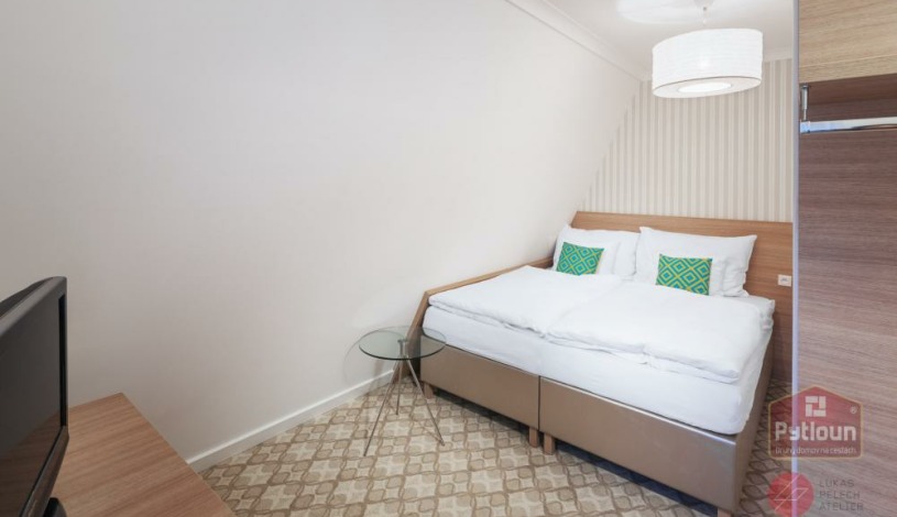 Pytloun Wellness Hotel Harrachov**** - Dvoupokojový rodinný apartmán typu Deluxe s manželskou postelí nebo oddělenými postelemi a balkónem
