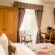 Dvoulůžkový pokoj typu Grand Deluxe s manželskou postelí - Hotel Questenberk Praha