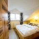 Pokoj s manželskou postelí velikosti King a lázeňskou vanou 4B - Rezidence Mandragora Pardubice